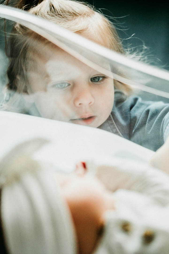Fresh 48 Newborn session, baby girl with pouty lips, photographed by Heidi Rakas at Sacred-Heart Riverbend hospital in Springfield Oregon