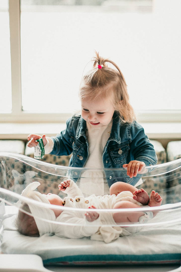 Fresh 48 Newborn session, baby girl with pouty lips, photographed by Heidi Rakas at Sacred-Heart Riverbend hospital in Springfield Oregon